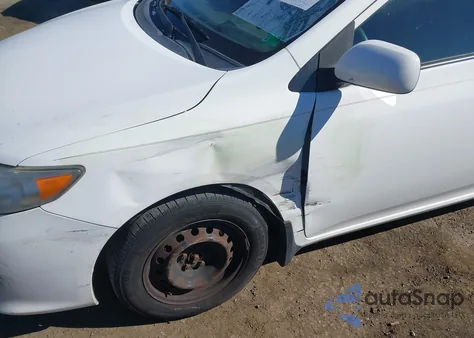 2009 Toyota Corolla Le из США, поврежденный, VIN 1NXBU40E69Z133329